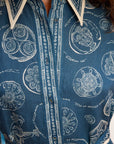 Linen mini shirtdress: ALÉMAIS Lucky Mini Dress in Maritime Print featuring a pointed collar and long blouson sleeves close up. LUXAMORE