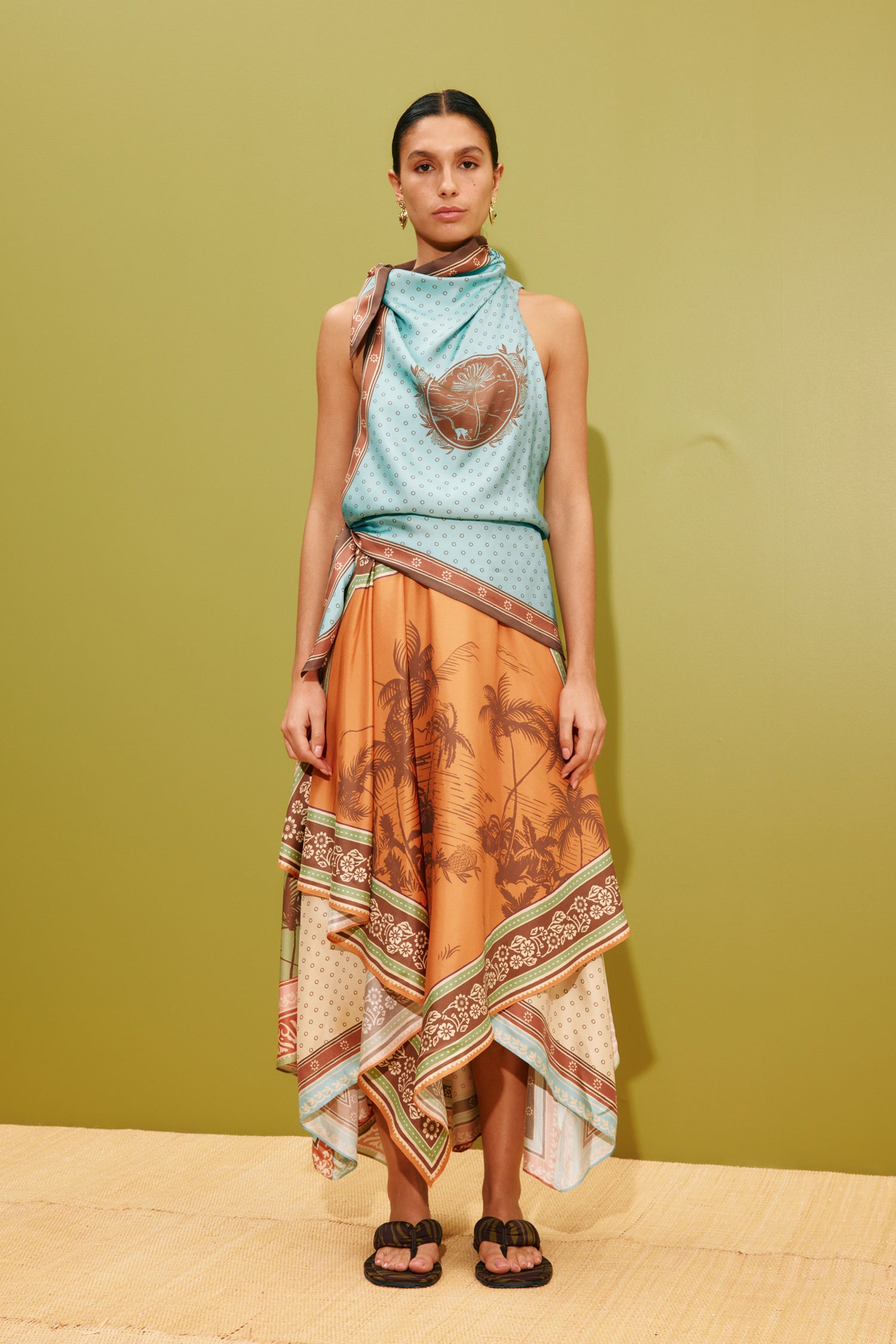 woman wearing Alemais Alberta Scarf Midi Dress LUXAMORE 