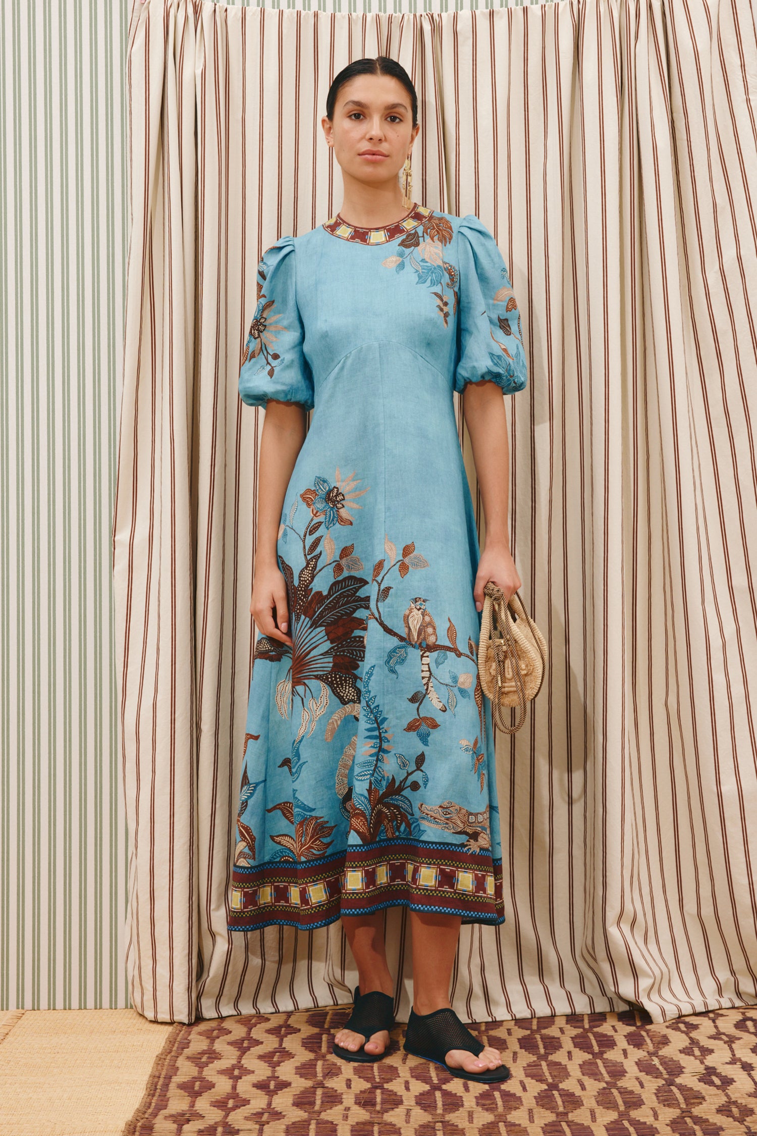 woman wearing Alemais Georgie Midi Dress LUXAMORE 