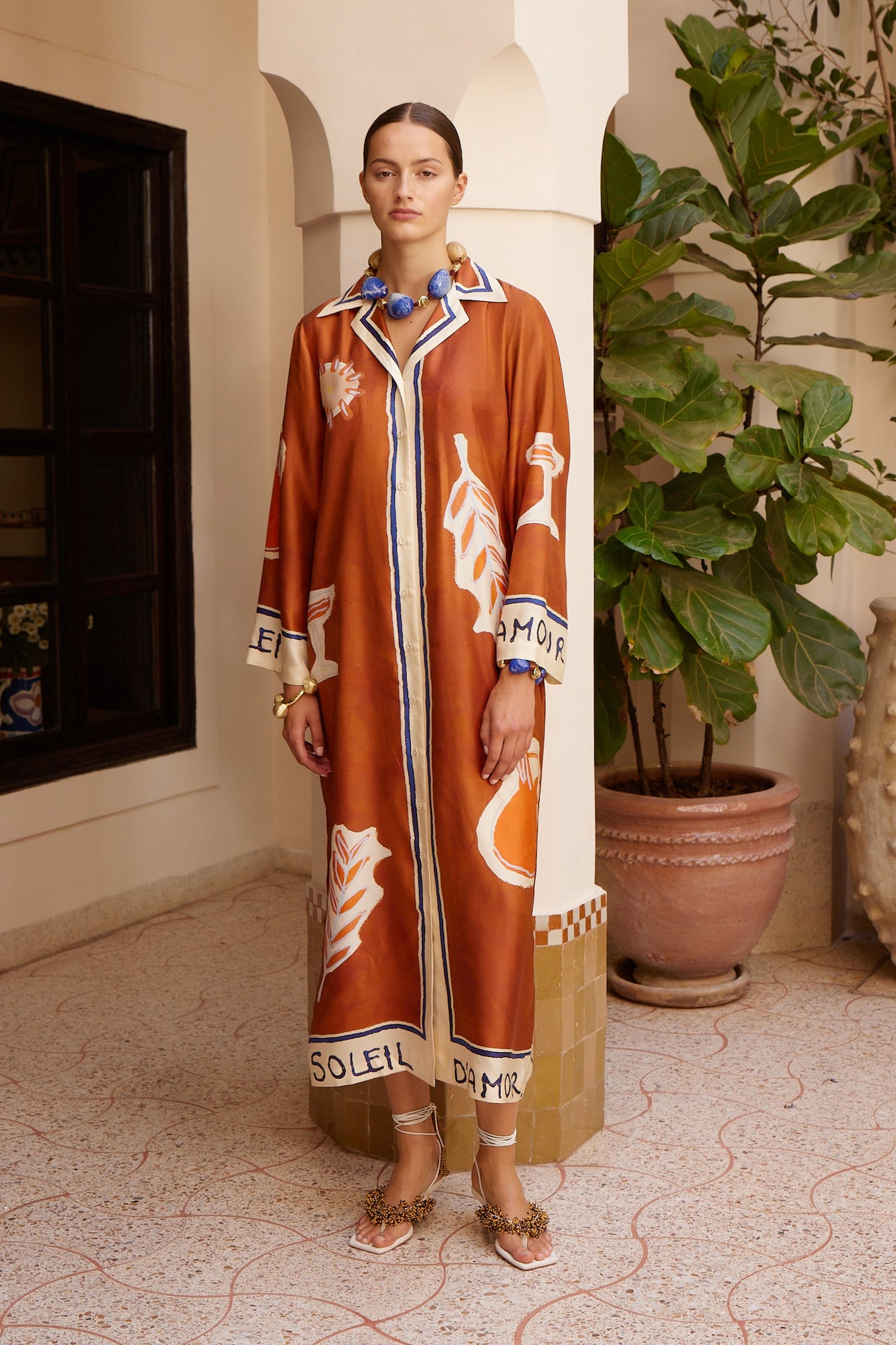 Woman Wearing Alemais Soleil D&#39;amour Silk Shirtdress - Dress LUXAMORE