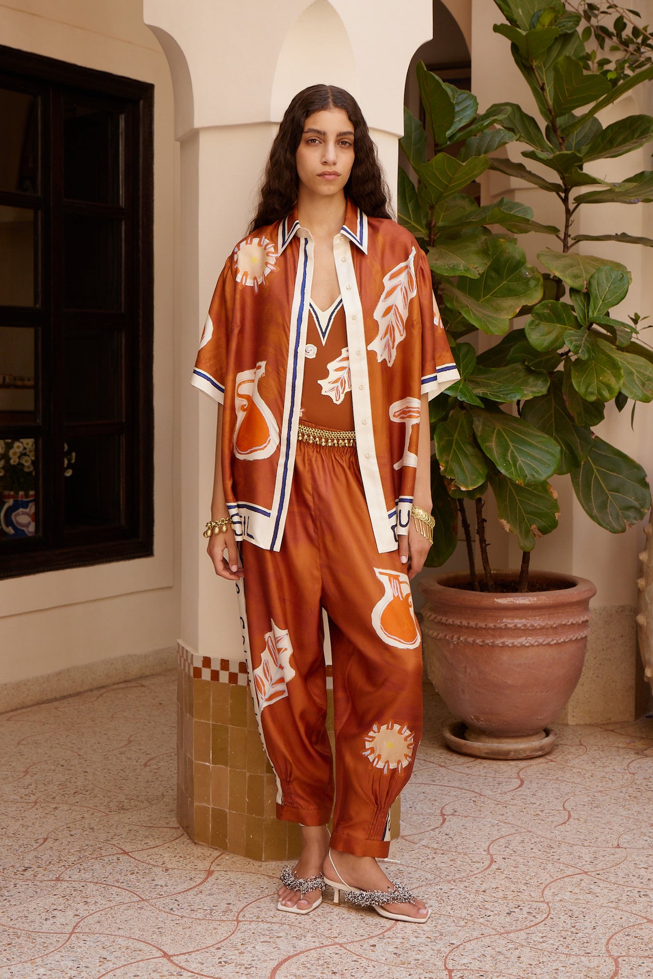 Woman Wearing Alemais Soleil d’Amour Silk Shirt - Top LUXAMORE