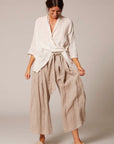 Estilo Emporio Batista Pant - White - LUXAMORE -Pants-Estilo Emporio Batista Pant ✔️ 100% Italian Linen – Sustainably crafted for breathable, all-day comfort✔️ High-Rise Silhouette ✔️ Adjustable Tie Waist. Shop Now