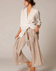Estilo Emporio Batista Pant - White - LUXAMORE -Pants-Estilo Emporio Batista Pant ✔️ 100% Italian Linen – Sustainably crafted for breathable, all-day comfort✔️ High-Rise Silhouette ✔️ Adjustable Tie Waist. Shop Now