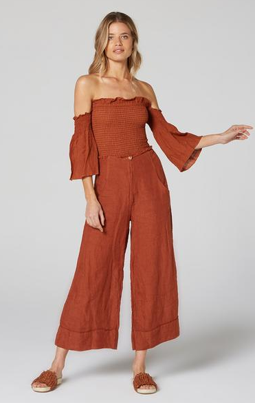 Estilo Emporio Fiorella Top - Rust - LUXAMORE -Tops-Shop the Estilo Emporio Fiorella Top in rust. Made in Positano from 100% Italian linen, this off-the-shoulder design features shirred details and fluted cuffs.