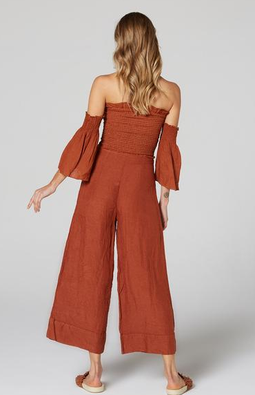Estilo Emporio Fiorella Top - Rust - LUXAMORE -Tops-Shop the Estilo Emporio Fiorella Top in rust. Made in Positano from 100% Italian linen, this off-the-shoulder design features shirred details and fluted cuffs.