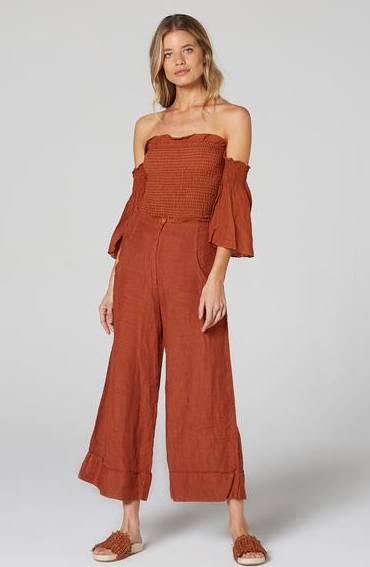 Estilo Emporio Fiorella Top - Rust - LUXAMORE -Tops-Shop the Estilo Emporio Fiorella Top in rust. Made in Positano from 100% Italian linen, this off-the-shoulder design features shirred details and fluted cuffs.