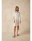 Estilo Emporio La Cota Cover Up Linen Dress worn by model in natural setting LUXAMORE 
