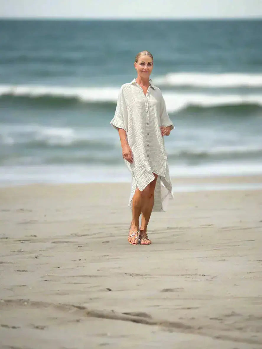 Estilo Emporio La Cota Cover Up Linen Dress Lyla worn by model in natural setting LUXAMORE 