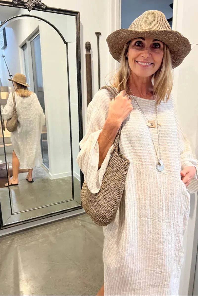 Estilo Emporio Nebbilio Linen Dress - Lyla worn by model in natural setting LUXAMORE 