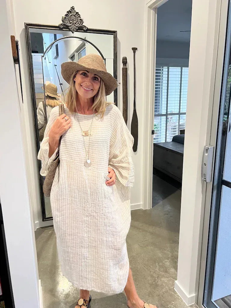 Estilo Emporio Nebbilio Linen Dress - Lyla worn by model in natural setting LUXAMORE 