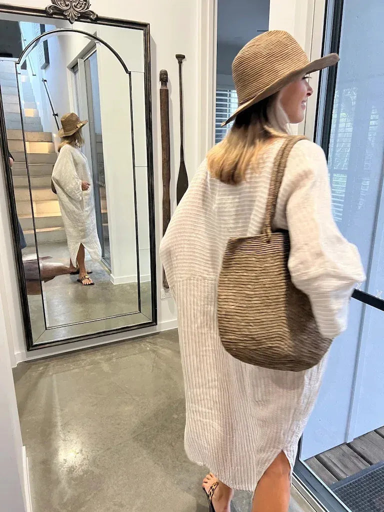 Estilo Emporio Nebbilio Linen Dress - Lyla worn by model in natural setting LUXAMORE 