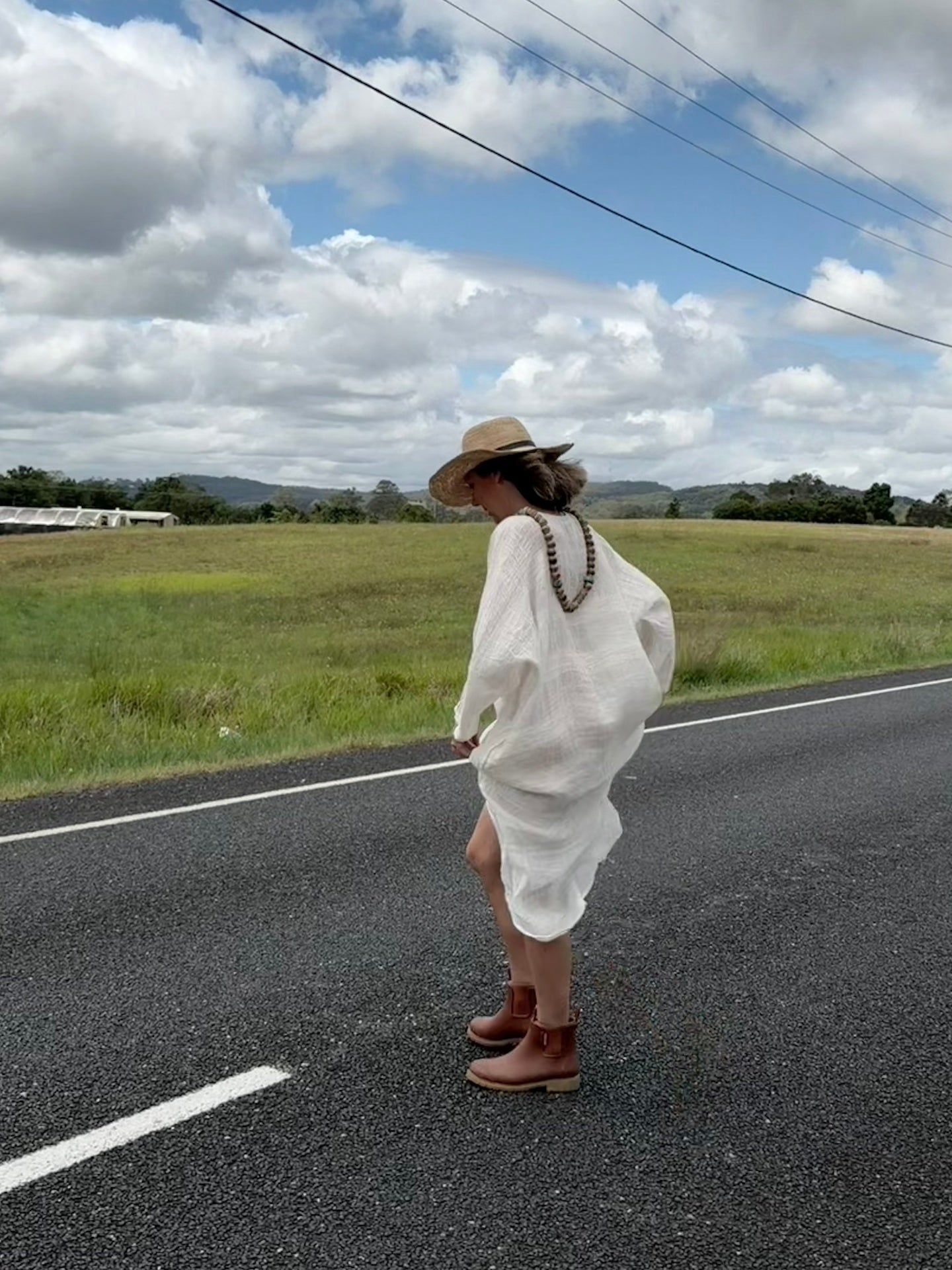 Person wearing Estilo Emporio Neve Linen Dress -Tela Atena Panna - Dress LUXAMORE