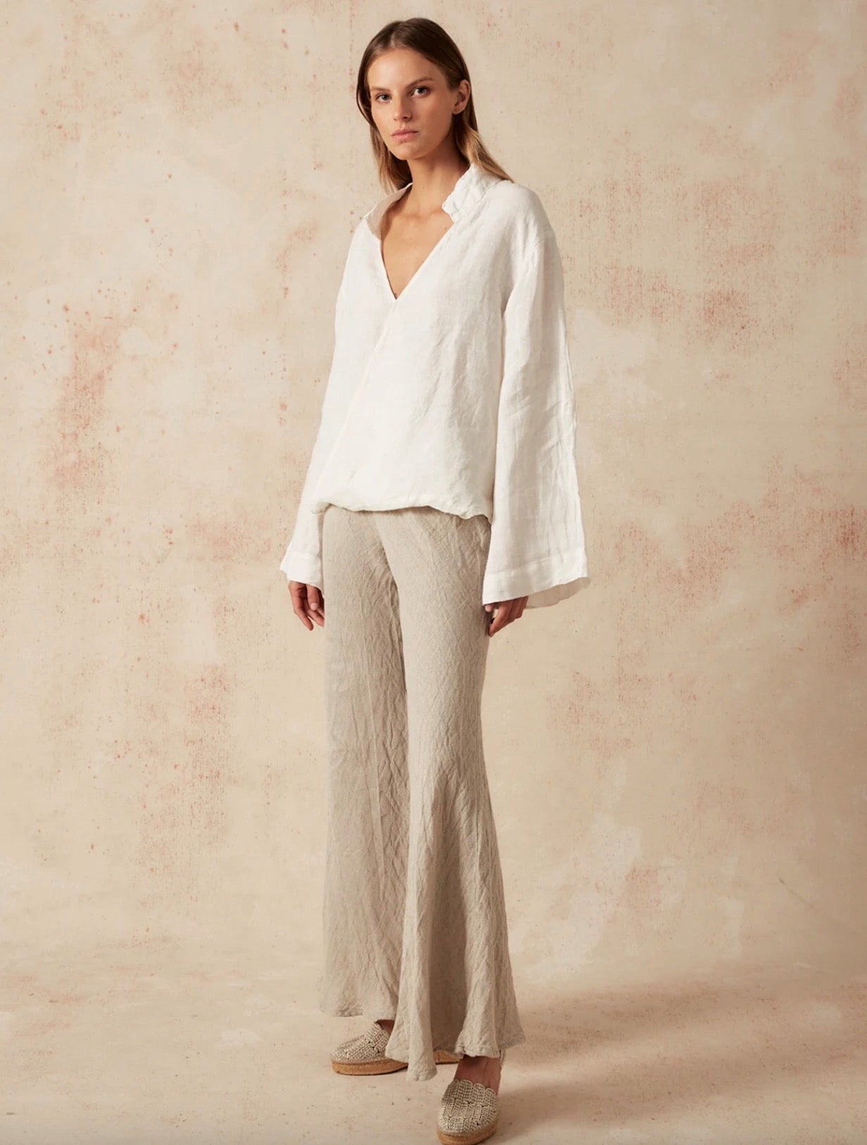 Estilo Emporio Novo Flare Pant - Brasile Natural - LUXAMORE -Pants-Estilo Emporio Novo Flare Pant in Natural 100% Italian linen made in Positano. High-waisted, flare cut. Travel in style. Shop Estilo Emporio Pants.