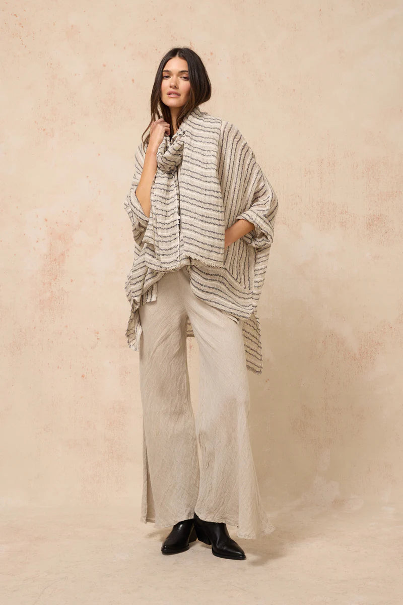 Estilo Emporio Novo Flare Pant - Brasile Natural - LUXAMORE -Pants-Estilo Emporio Novo Flare Pant in Natural 100% Italian linen made in Positano. High-waisted, flare cut. Travel in style. Shop Estilo Emporio Pants.