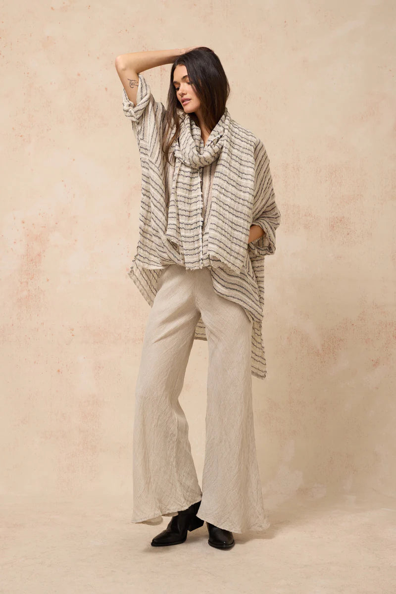 Estilo Emporio Novo Flare Pant - Brasile Natural - LUXAMORE -Pants-Estilo Emporio Novo Flare Pant in Natural 100% Italian linen made in Positano. High-waisted, flare cut. Travel in style. Shop Estilo Emporio Pants.