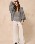 Woman Wearing Estilo Emporio Oboe Linen Shirt - Rete Nero - Top LUXAMORE