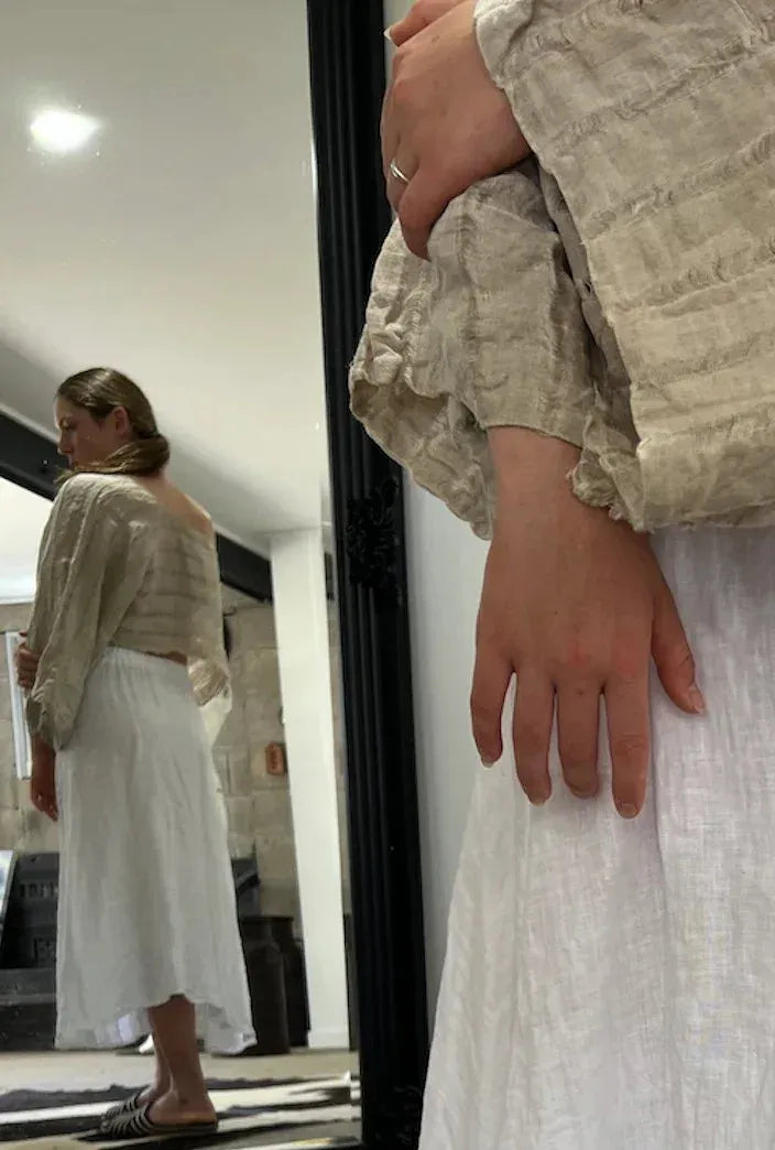 Estilo Emporio Raffles Top worn by model in natural setting LUXAMORE 