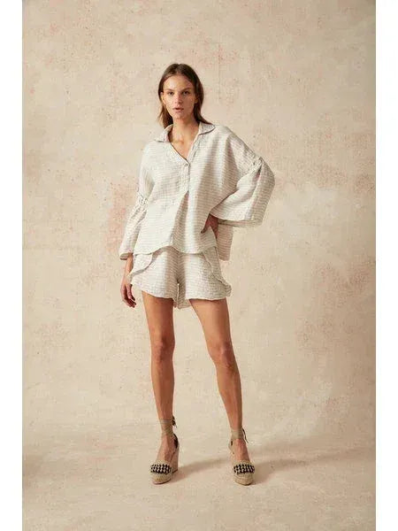 Estilo Emporio Siesta Top worn by model in natural setting LUXAMORE 