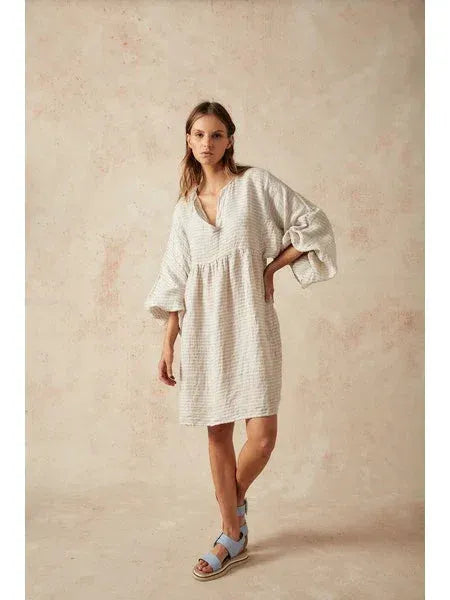 Estilo Emporio Stella Linen Dress - Lyla worn by model in natural setting LUXAMORE 