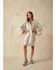 Estilo Emporio Stella Linen Dress - Lyla worn by model in natural setting LUXAMORE 