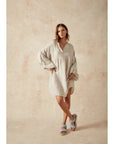 Estilo Emporio Stella Linen Dress - Lyla worn by model in natural setting LUXAMORE 