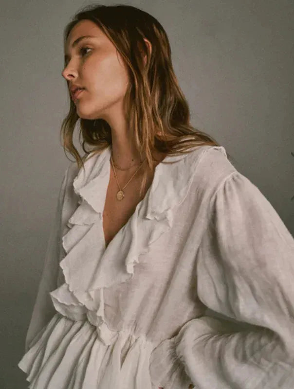 Estilo Emporio Tome Blouse - Tobacco worn by model in natural setting LUXAMORE 