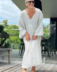 Estilo Emporio Zorba Maxi Linen Dress worn by model in natural setting LUXAMORE 