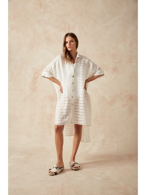 stilo Emporio La Cota Cover Up Dress, 100% Italian linen, made in Positano, Italy. Features a lightweight, breathable design with a relaxed one-size fit, elegant Panna White Stripe weave, and versatile button-up styling for effortless sophistication.