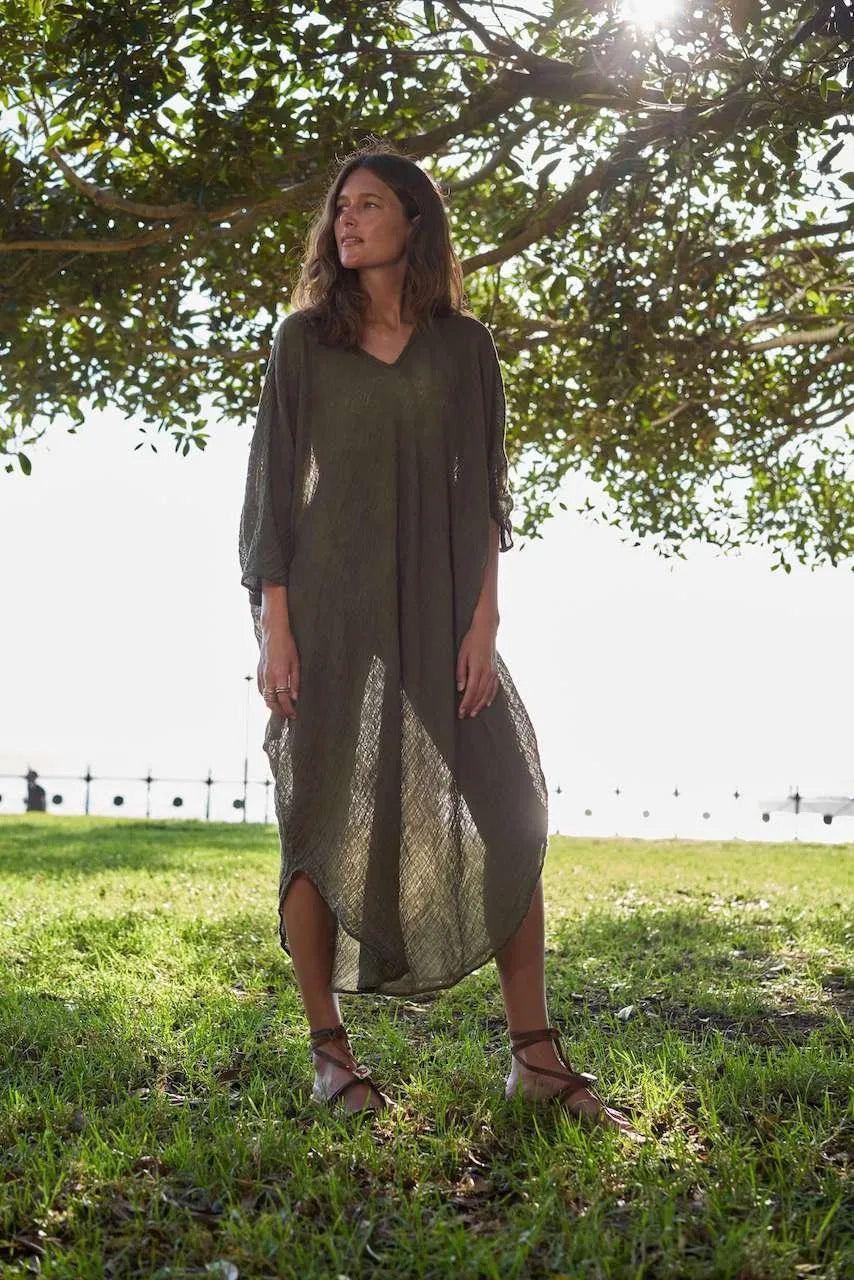 La Bottega di Brunella Linen Dress Vestito Fausta Garzata - Fossil worn by model in natural setting LUXAMORE 