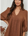 Linen Dress Balloon Sleeve - Made in Italy - Tobacco worn by model in natural setting LUXAMORE 