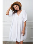 woman wearing Linen Dress Mini Babydoll Made in Italy - Taupe LUXAMORE 