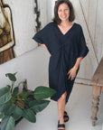 Woman Wearing Linen Dress V-neck Knot Front Midi Made in Italy Black - Dress LUXAMORE