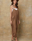 woman wearing Linen Jumpsuit Made in Italy Tobacco LUXAMORE 