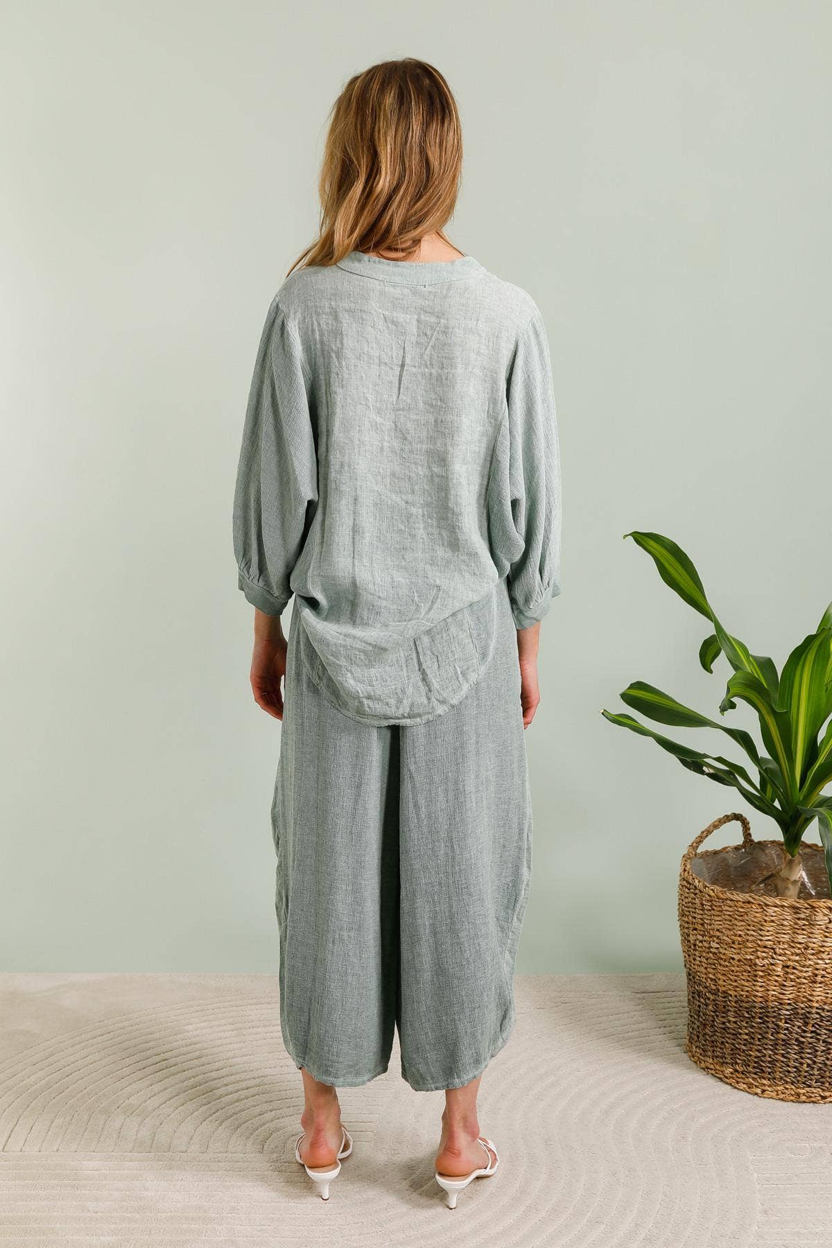 Linen Trousers made in Italy Charcoal Grey worn by model in natural setting LUXAMORE 