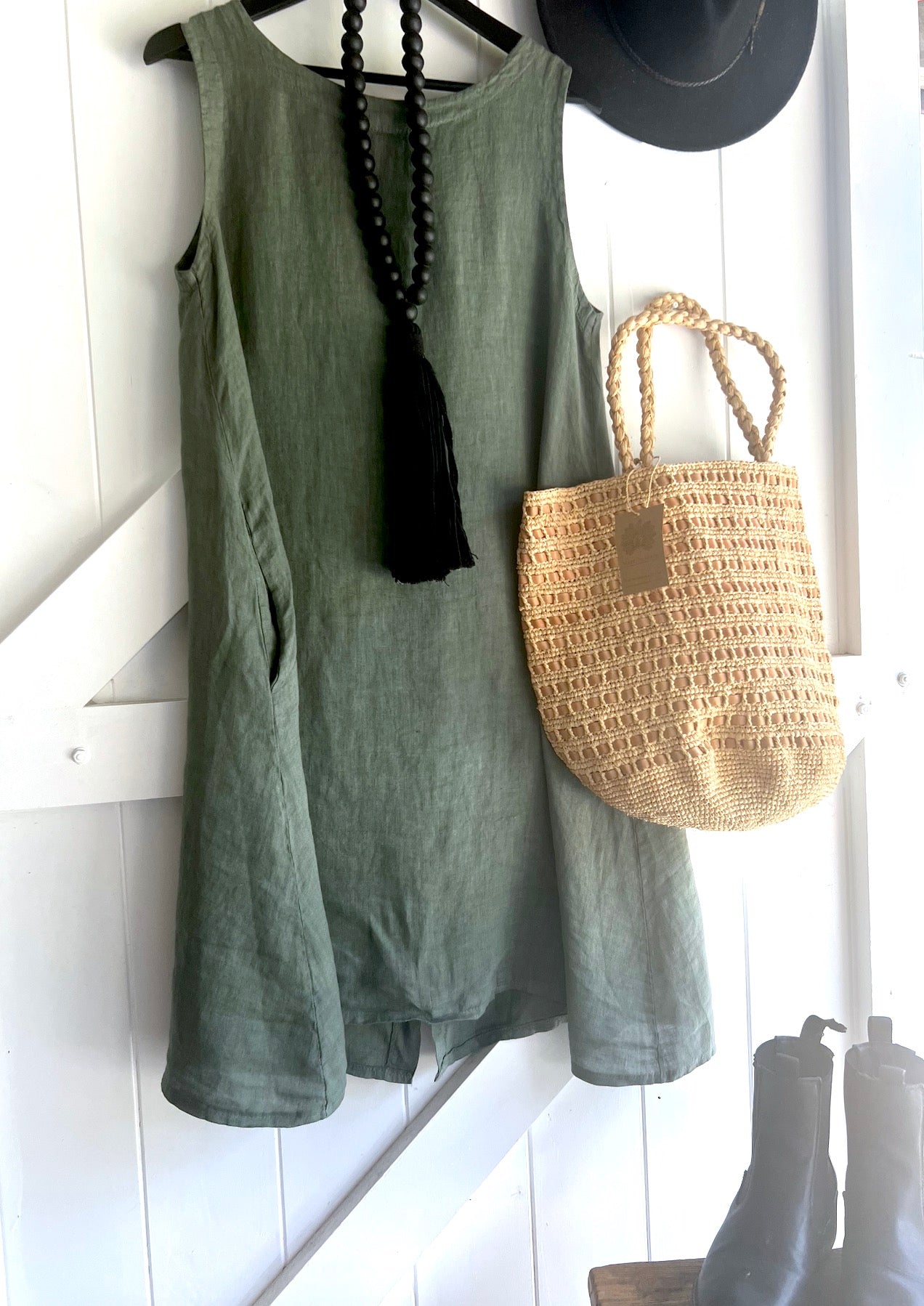 Made in Italy Cascade Linen Dress Olive - LUXAMORE -Dress-LUXAMORE Cascade Linen Dress breathable; with pockets, buttons and a longer back is a timeless wardrobe essential. Shop Italian linen dresses made in italy.