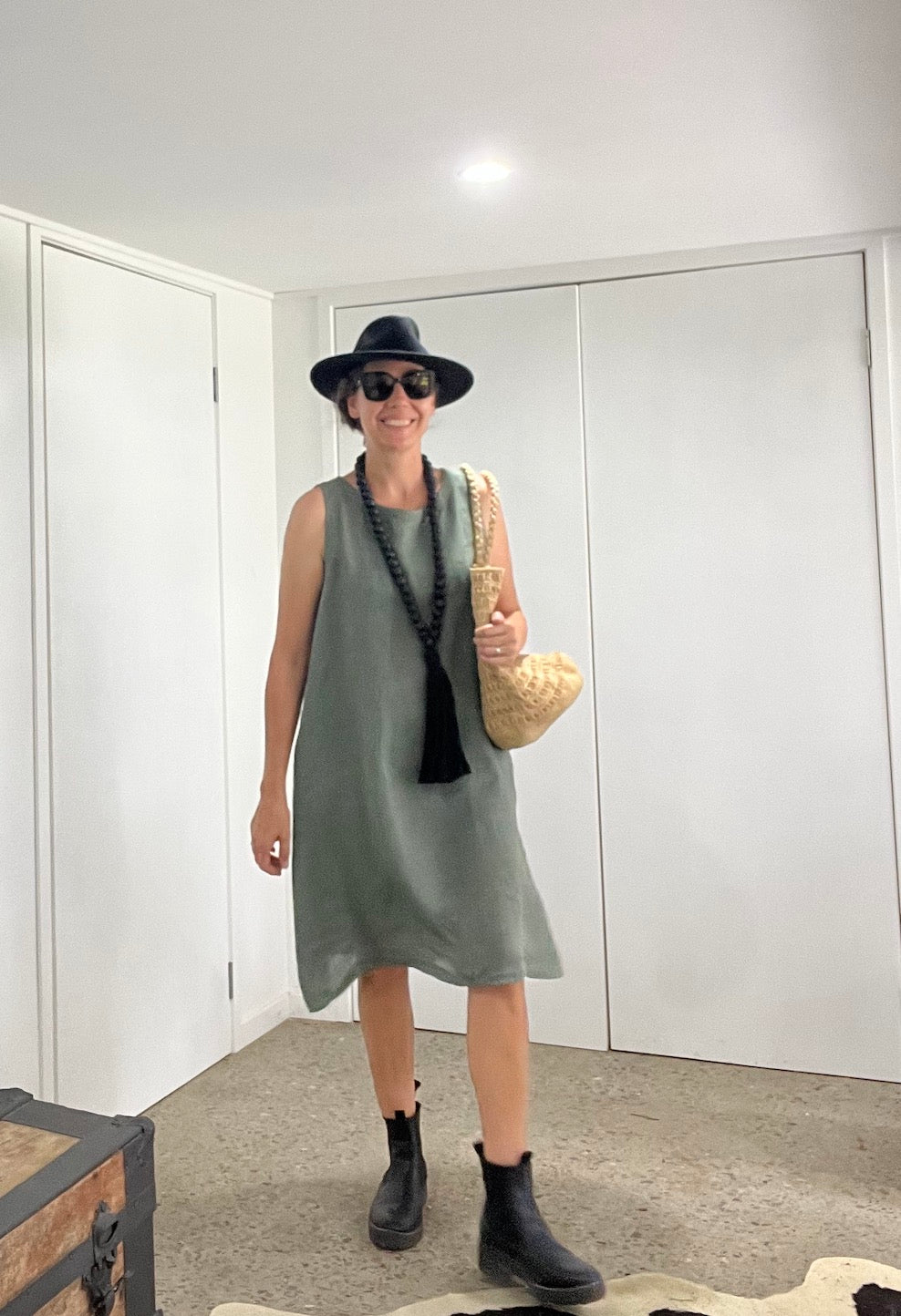 Made in Italy Cascade Linen Dress Olive - LUXAMORE -Dress-LUXAMORE Cascade Linen Dress breathable; with pockets, buttons and a longer back is a timeless wardrobe essential. Shop Italian linen dresses made in italy.
