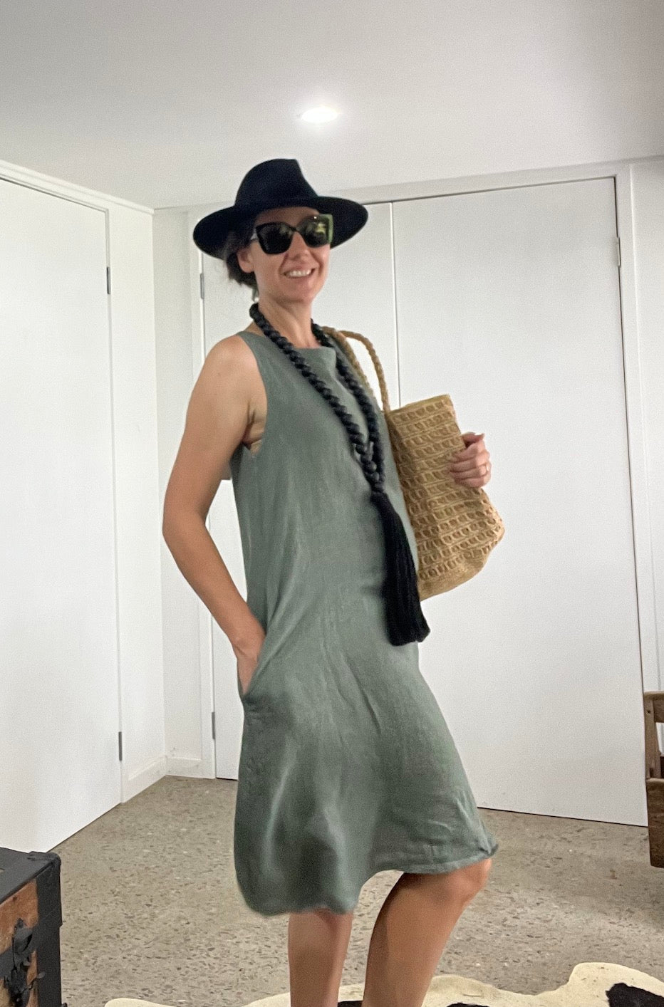 Made in Italy Cascade Linen Dress Olive - LUXAMORE -Dress-LUXAMORE Cascade Linen Dress breathable; with pockets, buttons and a longer back is a timeless wardrobe essential. Shop Italian linen dresses made in italy.