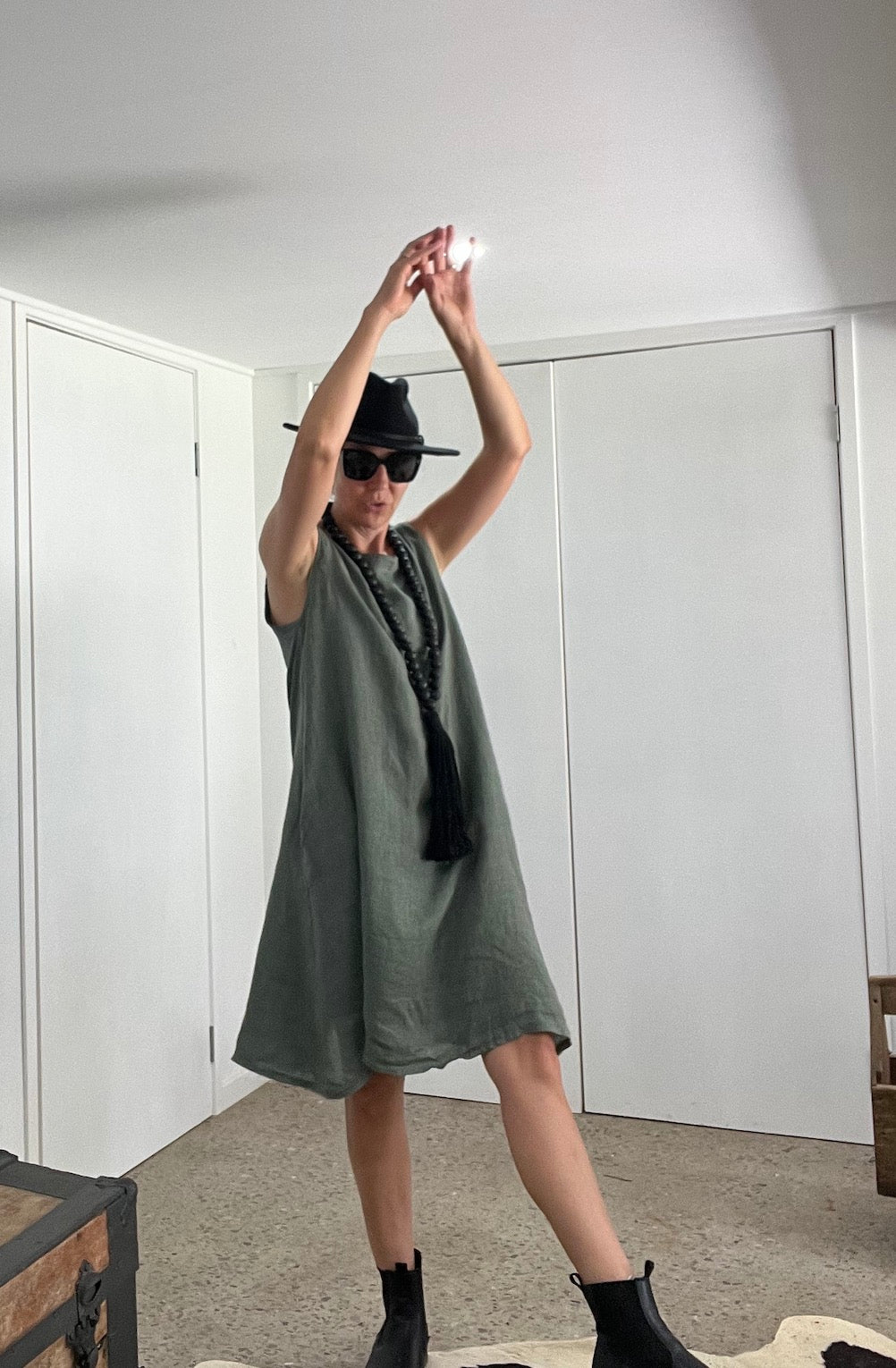 Made in Italy Cascade Linen Dress Olive - LUXAMORE -Dress-LUXAMORE Cascade Linen Dress breathable; with pockets, buttons and a longer back is a timeless wardrobe essential. Shop Italian linen dresses made in italy.