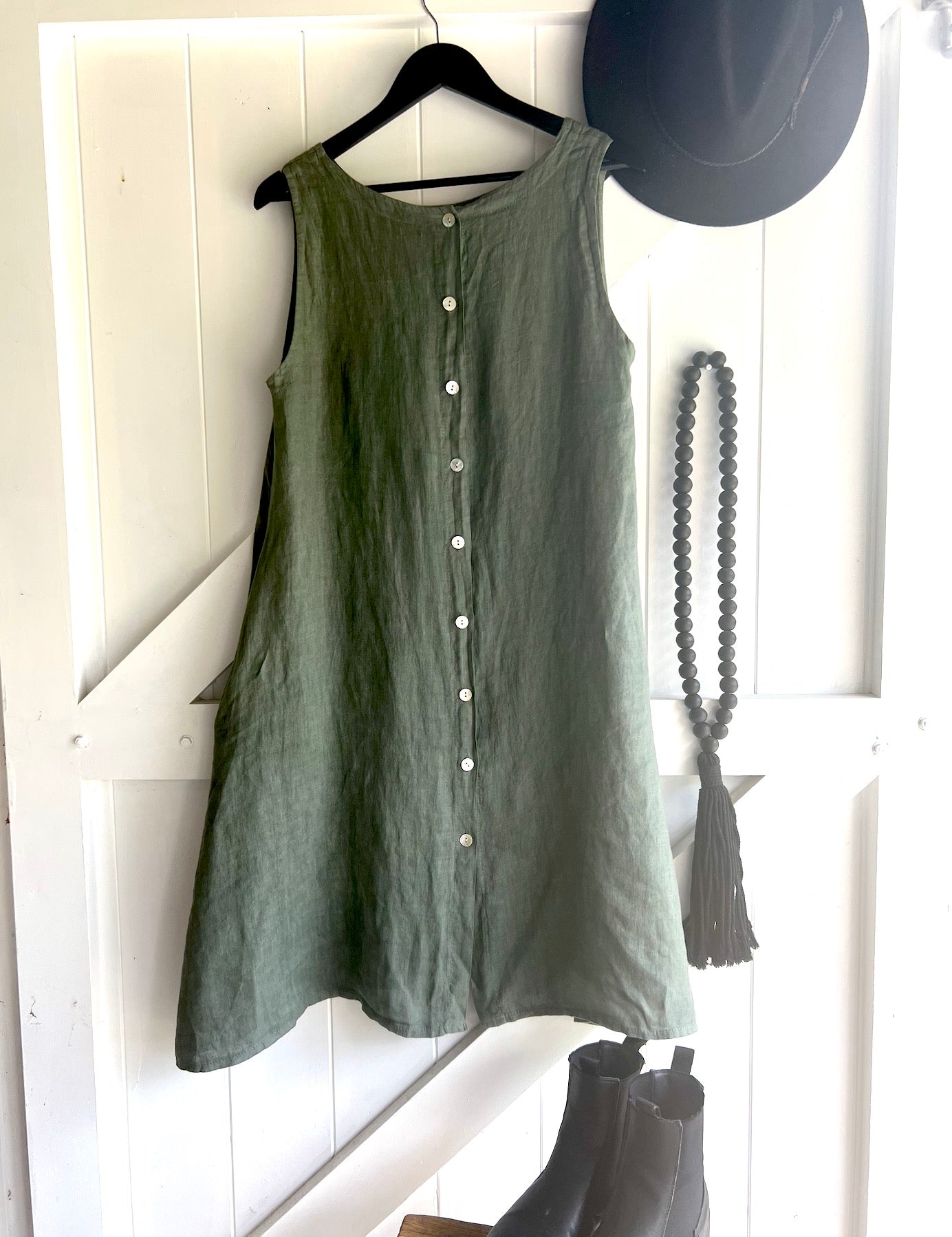 Made in Italy Cascade Linen Dress Olive - LUXAMORE -Dress-LUXAMORE Cascade Linen Dress breathable; with pockets, buttons and a longer back is a timeless wardrobe essential. Shop Italian linen dresses made in italy.