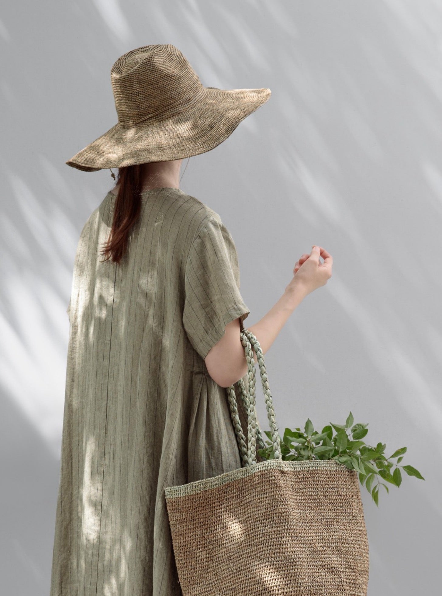 Woman Wearing Made in Mada Hat AZIZ - hat LUXAMORE