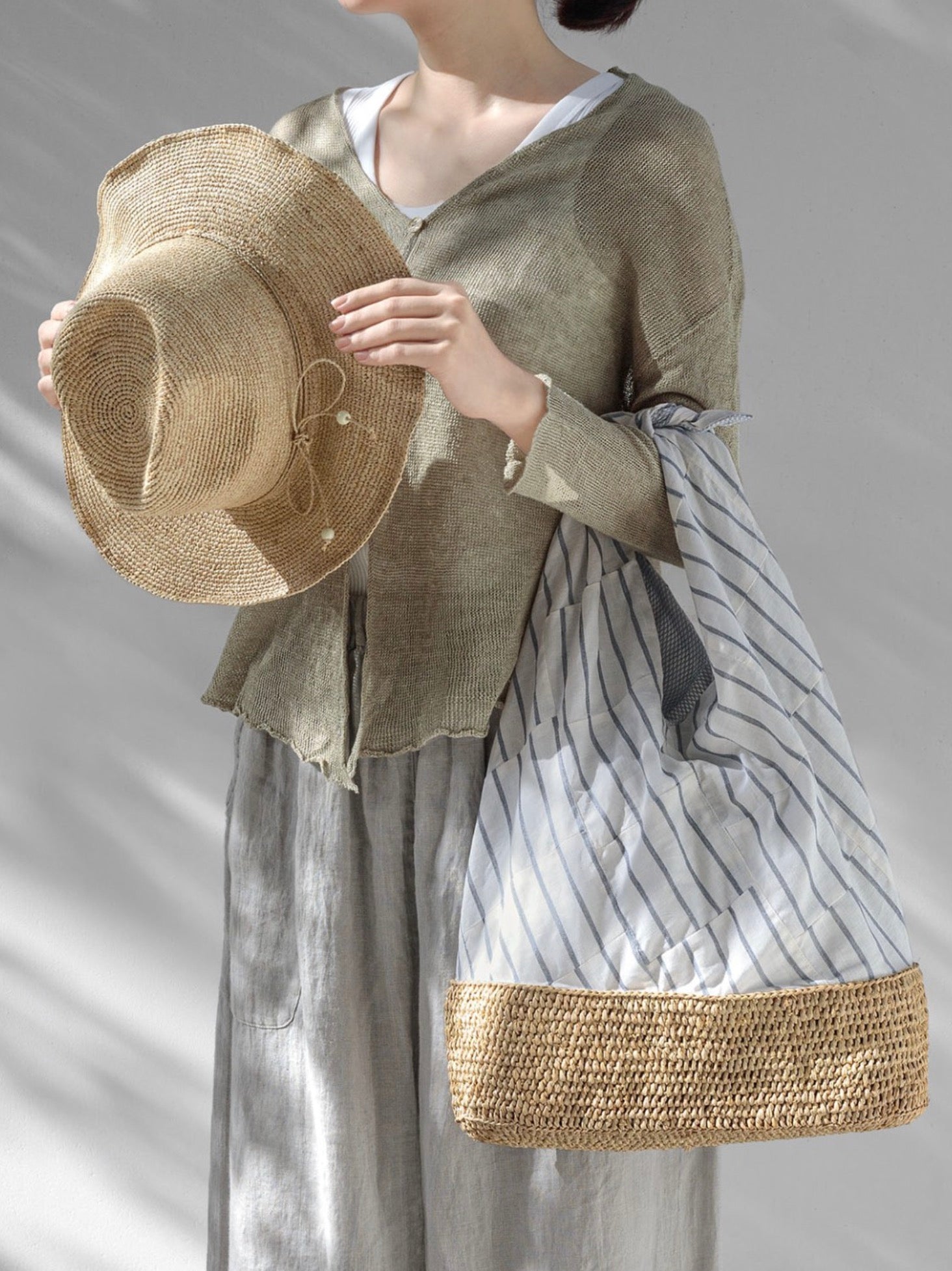 Woman Wearing Made in Mada Hat AZIZ - hat LUXAMORE