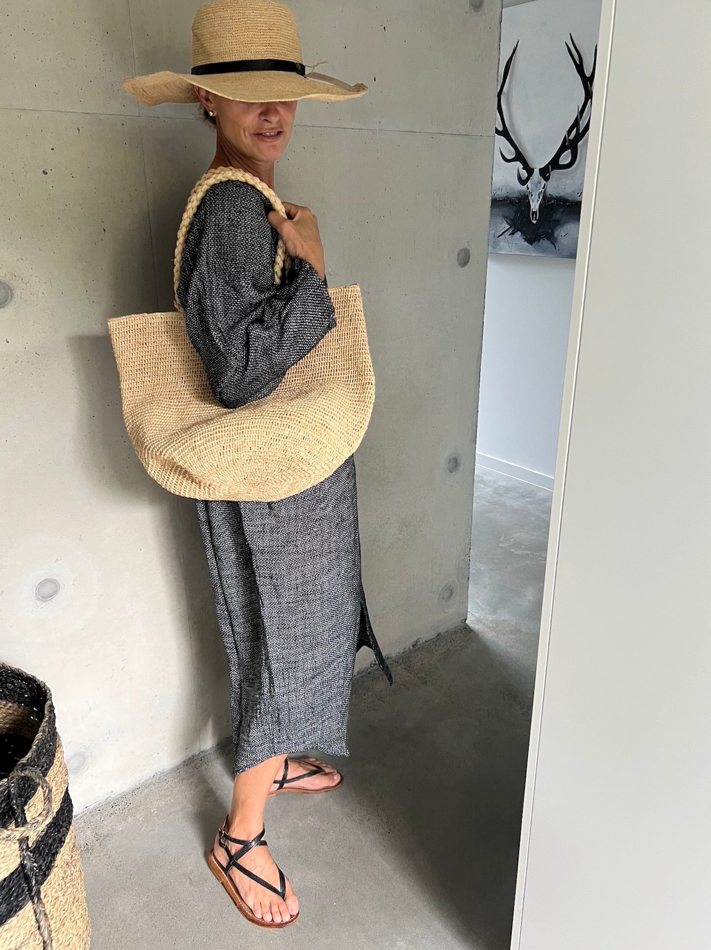 Woman Wearing Made in Mada Hat Gaston - hat LUXAMORE