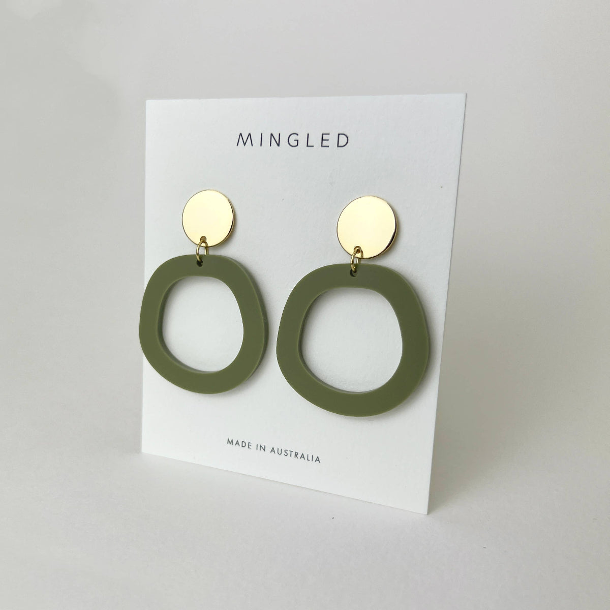 Mingled Charlie Olive Green and Gold Dangle Earrings - LUXAMORE -Earings-The Charlie Olive Green and Gold Dangle earrings are a modern statement earring in lightweight hypoallergenic laser cut acrylic with a gold plated decorative stud disc. The stud post is made from hypoallergenic Surgical Stainless Steel (304). They are extremely lightweight, you won't even know you have them on.