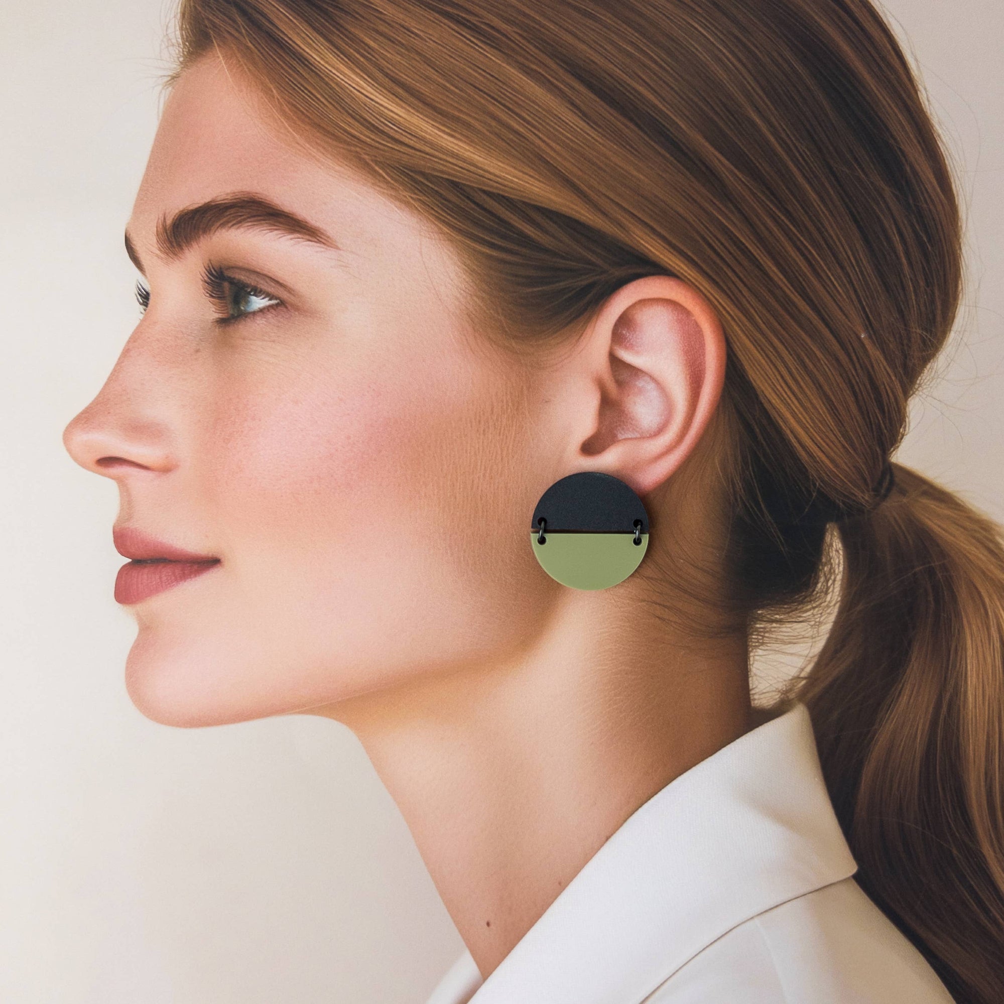 Mingled Statement Studs in Olive Green and Black - LUXAMORE --The TWO PIECE Statement Studs in Black and Olive Green are the perfect modern minimalist earrings. The geometric, large round half discs are joined with high quality black coated stainless steel jump rings Studs. Handmade in Australia with surgical steel hypoallergenic posts making them perfect for sensitive ears. Made from highly durable acrylic, these earrings are super lightweight, you won't even know you are wearing them.