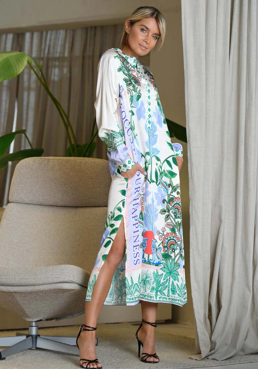 Miss Goodlife Midi Dress Green Garden Made in Italy worn by model in natural setting LUXAMORE 