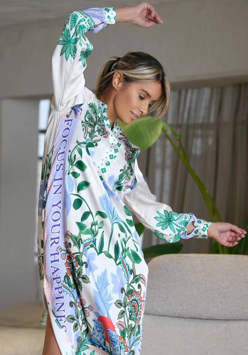 Miss Goodlife Midi Dress Green Garden Made in Italy worn by model in natural setting LUXAMORE 