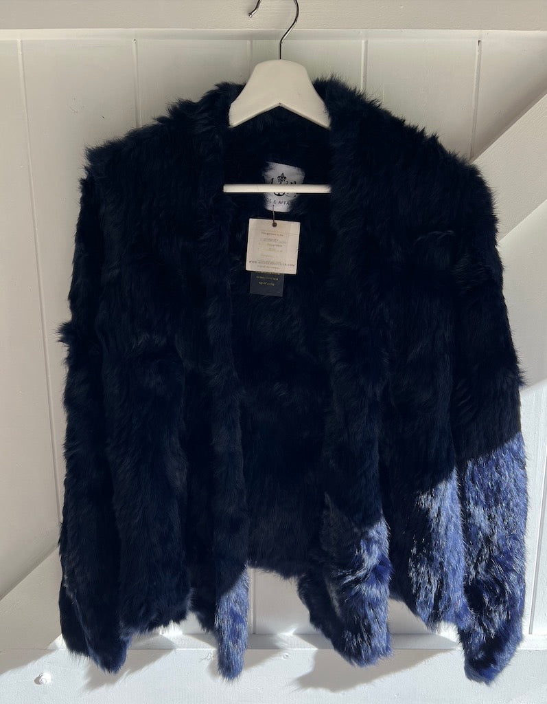 Mode &amp; Affaire Cascade Fur Jacket In Ink - LUXAMORE -JACKET-Mode &amp; Affaire Cascade Fur Jacket The Mode &amp; Affaire Cascade Rabbit Fur Jacket is a sustainable and ethically crafted winter staple Shop Mode &amp; Affaire Fur