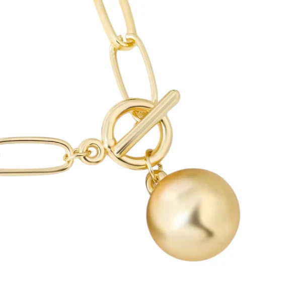 Orna Curio Golden Years Gold Plated Bracelet - LUXAMORE -Bracelets-Gold Plated Bracelet The perfect bracelet Introducing the 'Golden Years' Bracelet, a heartfelt homage to the legendary David Bowie. Crafted in stunning gold-plated alloy, this bracelet stands as a statement piece on its own or offers the canvas for your creativity with the addition of your favorite charms. It showcases a captivating hanging ball and a bold large link chain. Materials: Gold Plated Alloy Measurements: 18cm