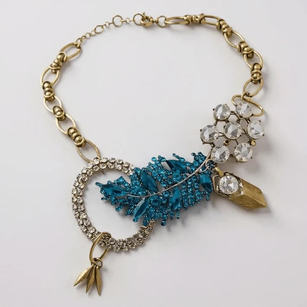 Orna Curio Vintage Bespoke Lagoon Leaf Statement Necklace - LUXAMORE -necklace-One of a Kind – Hand-crafted Necklace This exquisite necklace is a unique blend of vintage and modern elements, hand-crafted in Perth, WA. A symbol of the impeccable beauty and craftsmanship of Orna Curio Jewellery. Measurements: 60cm Adjustable Materials: Vintage Elements with Vintage Gold Plated Alloy