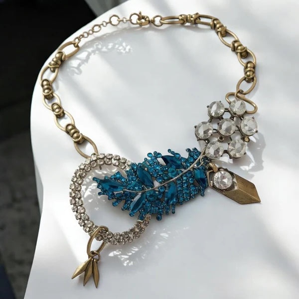 Orna Curio Vintage Bespoke Lagoon Leaf Statement Necklace - LUXAMORE -necklace-One of a Kind – Hand-crafted Necklace This exquisite necklace is a unique blend of vintage and modern elements, hand-crafted in Perth, WA. A symbol of the impeccable beauty and craftsmanship of Orna Curio Jewellery. Measurements: 60cm Adjustable Materials: Vintage Elements with Vintage Gold Plated Alloy